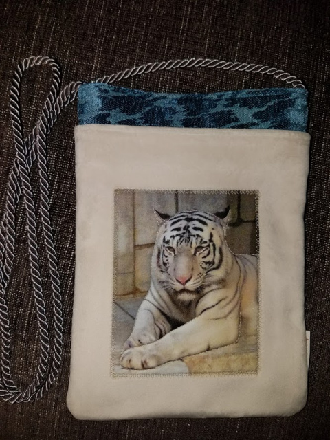 White tiger on cream fabric